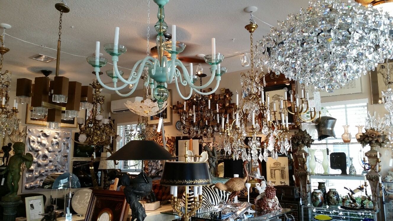 Ornate brass chandelier with frosted glass shades